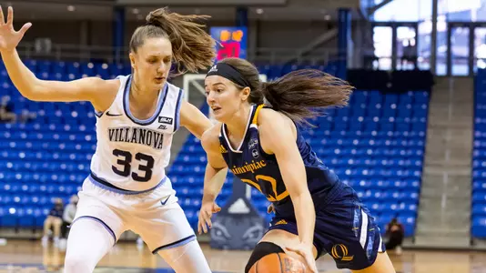Mackenzie DeWees drives to the basket against Villanova