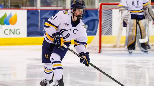 Kenzie Prater scans up the ice