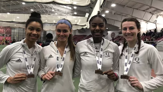 Davies, Halloran, Solomon, Scullin break school record in 4x400m