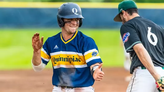 Colton Bender Celebrates at 3rd Base vs. Manhattan