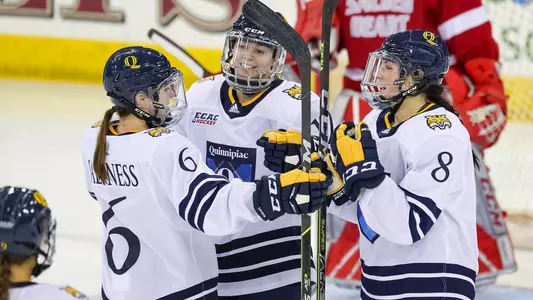 Saltness, Girard and Adzija celebrate  a goal