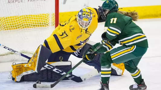 Logan Angers makes a save against Clarkson