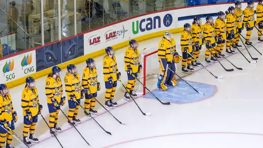 Women's ice hockey team lines up for pregame announcements