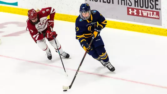Alexa Hoskin skates past a defender at Colgate