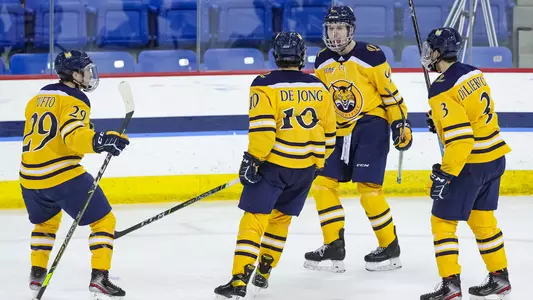 Ethan de Jong celebrates power-play goal with Ty Smilanic, Odeen Tufto and Peter DiLiberatore