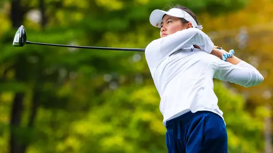 Aimee Uchida tees off at the QU Classic