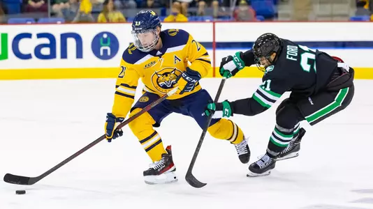 Metsa Carries Puck against North Dakota