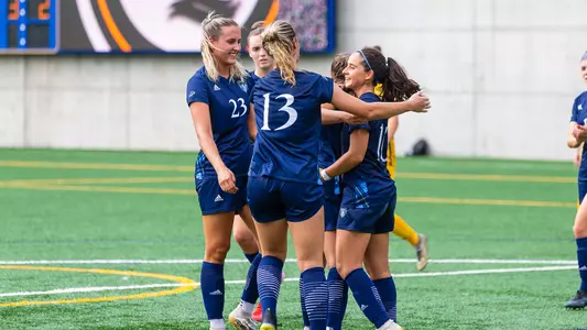 WSOC celebrates after scoring a goal