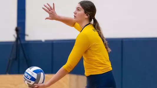 Nicole Legg sets up the serve