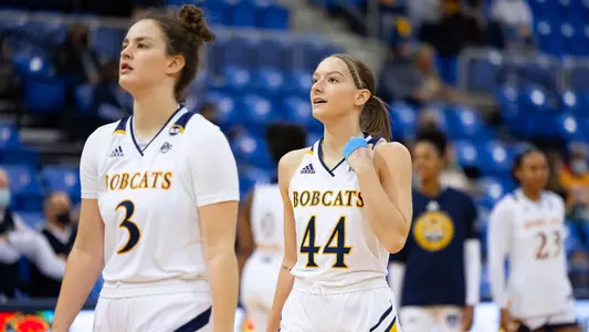 Halee Smith and Makenzie Helms survey the floor