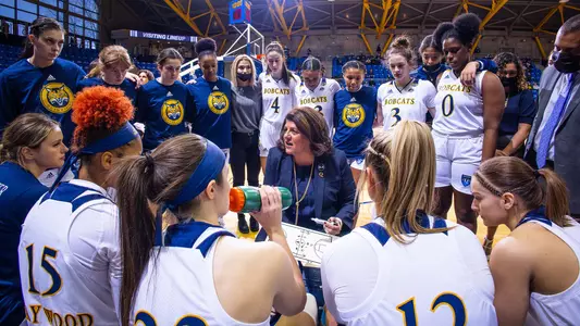 Tricia Fabbri preps her team during a time-out