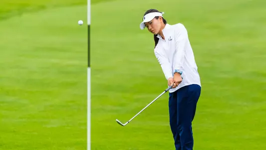 Aimee Uchida chips onto the green