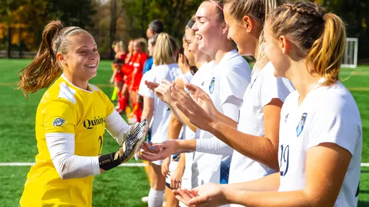 Sofia Lospinoso high fives teammates
