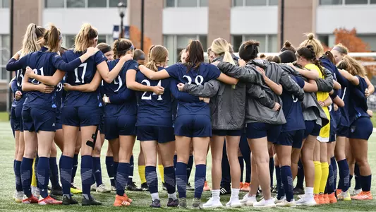 Team huddles before championship