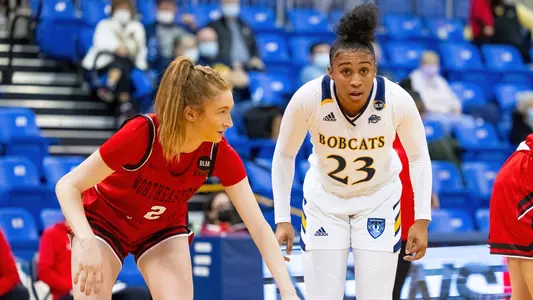 Sajada Bonner boxes out defender for a rebound