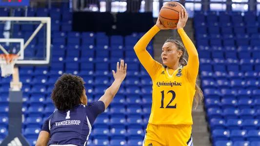 Rose Caverly Looking to Pass vs. Monmouth