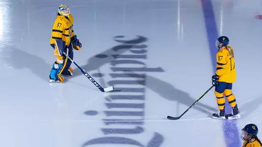 Logan Angers skates during starters