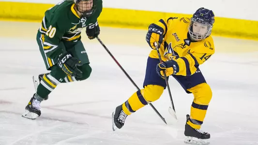 Grace Markey makes a pass vs Clarkson