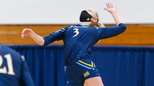 Morgan Sherwin Jumps to Spike the Ball vs. Canisius