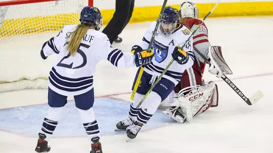 Laura Lundblad and Nina Steiguaf celebrate after a goal