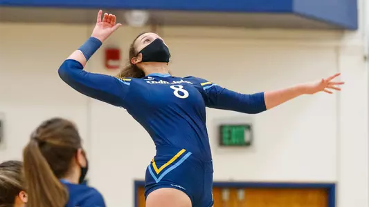 Maggie Baker Jumps Up to Hit the Ball vs. Canisius