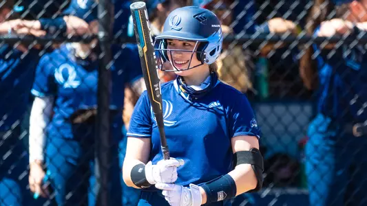Julia Woeste prepares to bat vs Monmouth