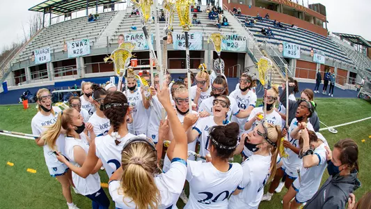 Women's Lacrosse Team Huddle vs. Manhattan