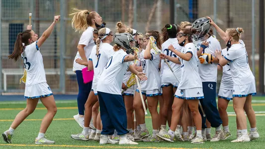 Women's Lacrosse Celebrates Win Over Manhattan