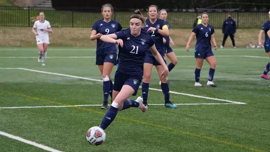 Rebecca Cooke saves the ball from going out-of-bounds