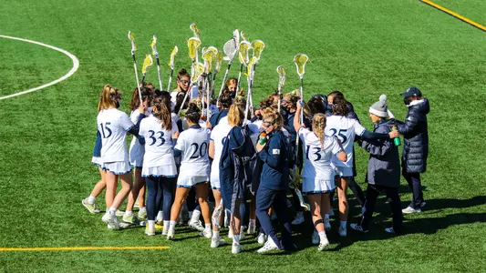 Women's Lacrosse Huddles During Time Out vs. Iona