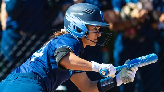 Karolyn Walkers lines up to bunt vs Monmouth