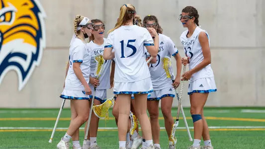 Women's Lacrosse Huddle After a Goal