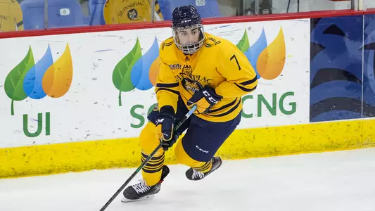Marcus Chorney Skates with Puck from Behind Own Goal