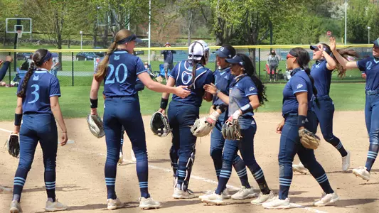Softball celebrates after win