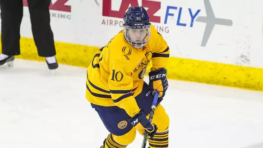 Ethan de Jong Skates in Defensive Zone with Puck