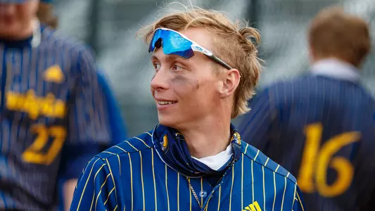 Derek Kasperzyk Smiles in Dugout vs. Siena