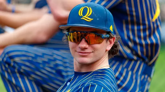 Andrew McDermott Smiles in Dugout vs. Siena