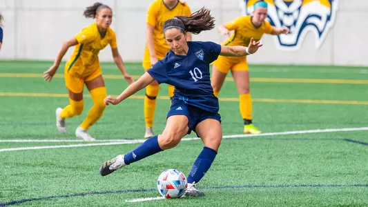 Selena Salas scores a penalty kick goal against Vermont