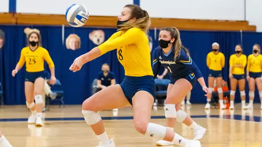 Maggie Baker digs against Fairfield