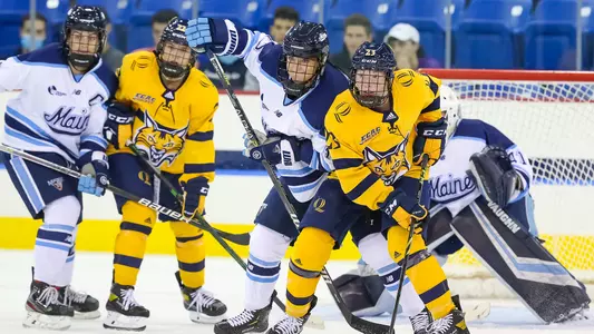 Sadie Peart sets a screen against Maine
