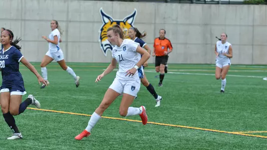 Rebecca Cooke prepares for the ball against Yale