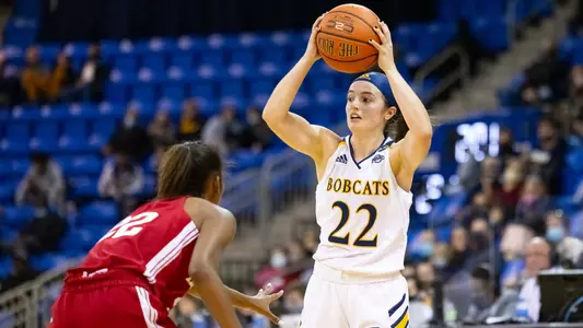 Mackenzie DeWees surveys the floor