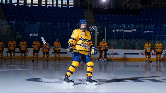 Olivia Mobley skates up to the blue line during pregame