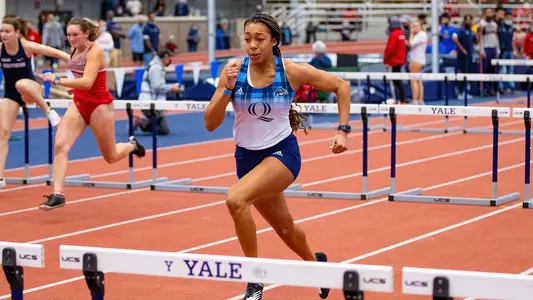 Symone Foster runs in the 60m hurdles at Yale