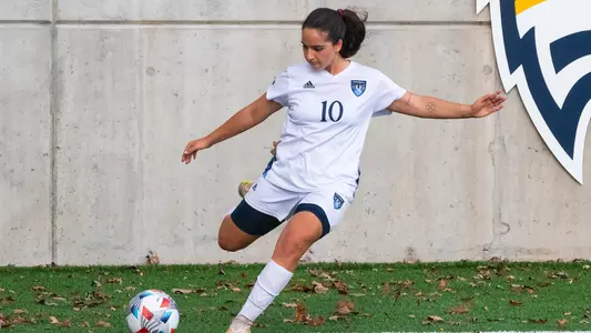 Selena Salas takes a corner kick against Marist