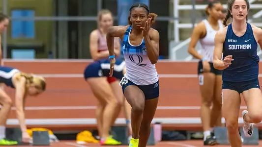 Aisha Gay runs in the 200m at Yale