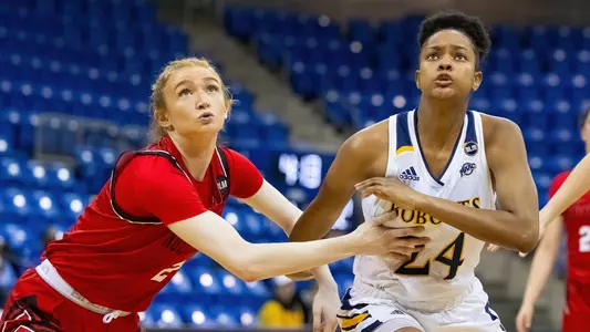 Amani Free boxes out for the rebound