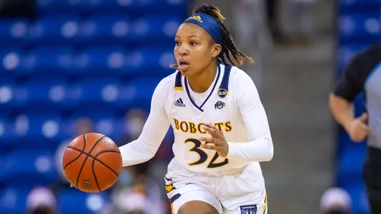 Reiven Douglas brings the ball up the court