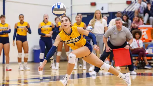 Yagmur Gunes dives for a dig