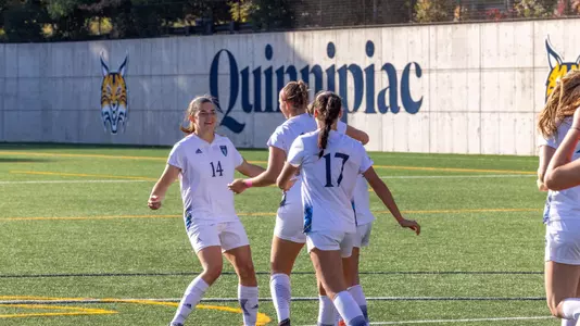 Women's soccer celebrates a goal against Rider